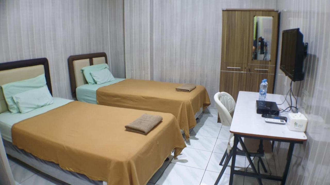 Nasional Hotel Гунунгситоли Экстерьер фото