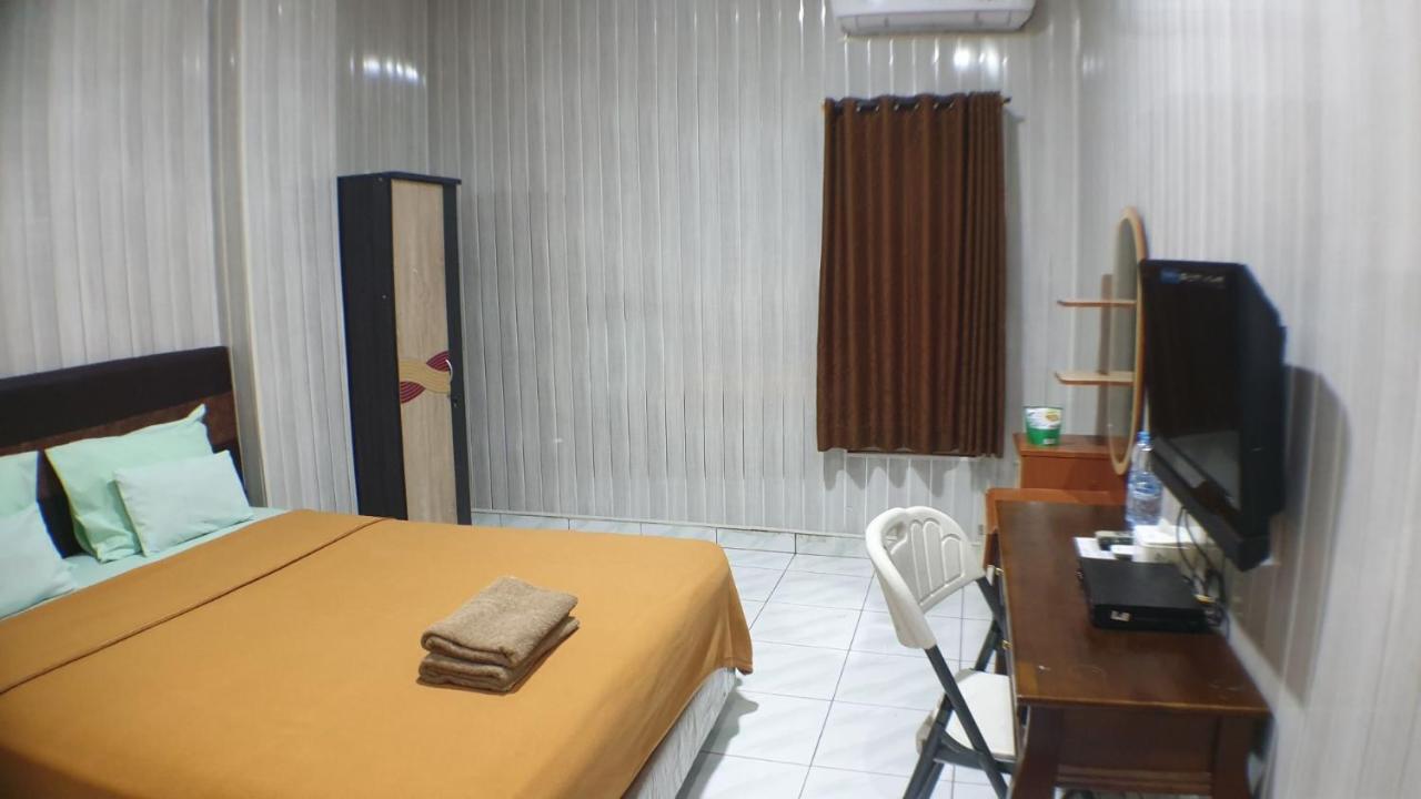Nasional Hotel Гунунгситоли Экстерьер фото